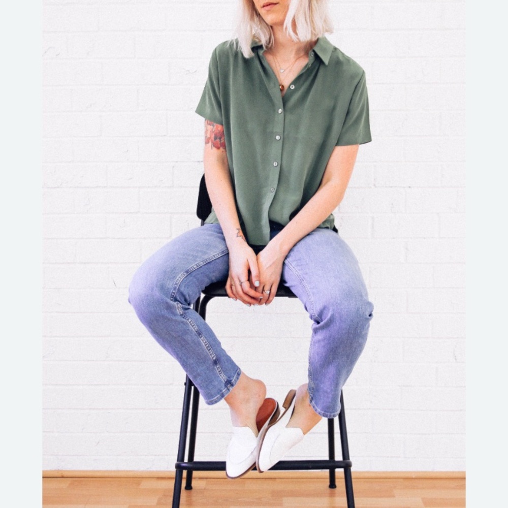 Green Button-Up Shirt and Light Blue Jeans